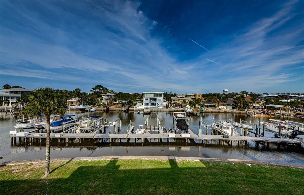 2393 Hanover Drive Dunedin, FL 34698 - Photo 1 of 1 YES! Your view! Waterfront Townhome with deeded boat slip in your backyard