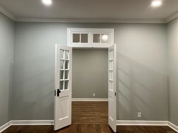 a view of a storage & utility room with a sink