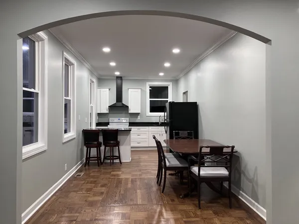 a view of a dining room with furniture