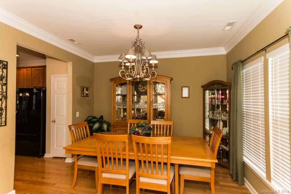 153 Snead Road, Unit 72 Fort Mill, SC 29715 - Photo 3 of 17 a dining room with furniture and window