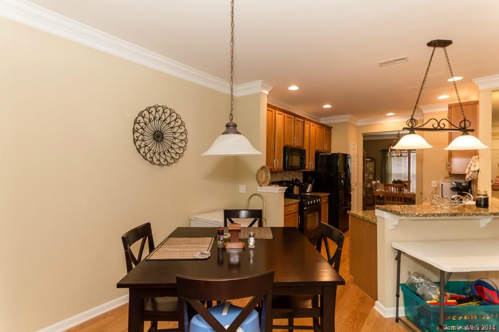 153 Snead Road, Unit 72 Fort Mill, SC 29715 - Photo 7 of 17 a view of a dining room and livingroom