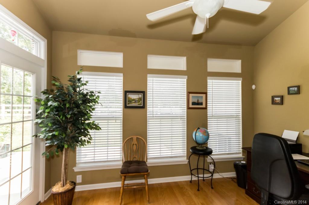 153 Snead Road, Unit 72 Fort Mill, SC 29715 - Photo 8 of 17 a view of a livingroom with furniture and a potted plant