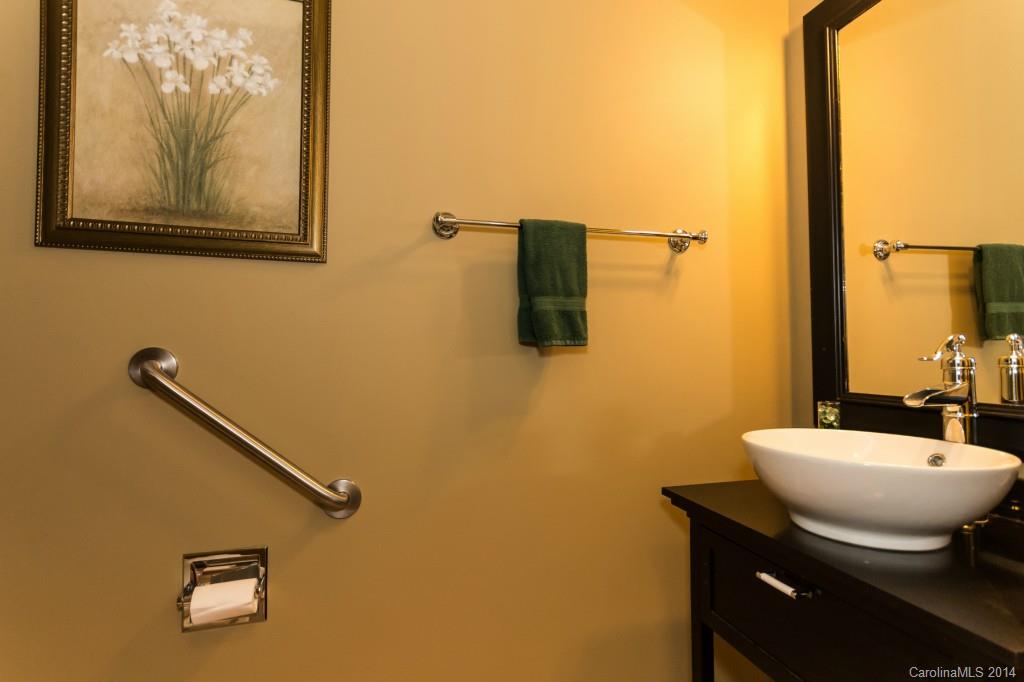 153 Snead Road, Unit 72 Fort Mill, SC 29715 - Photo 9 of 17 a bathroom with a sink mirror and toilet
