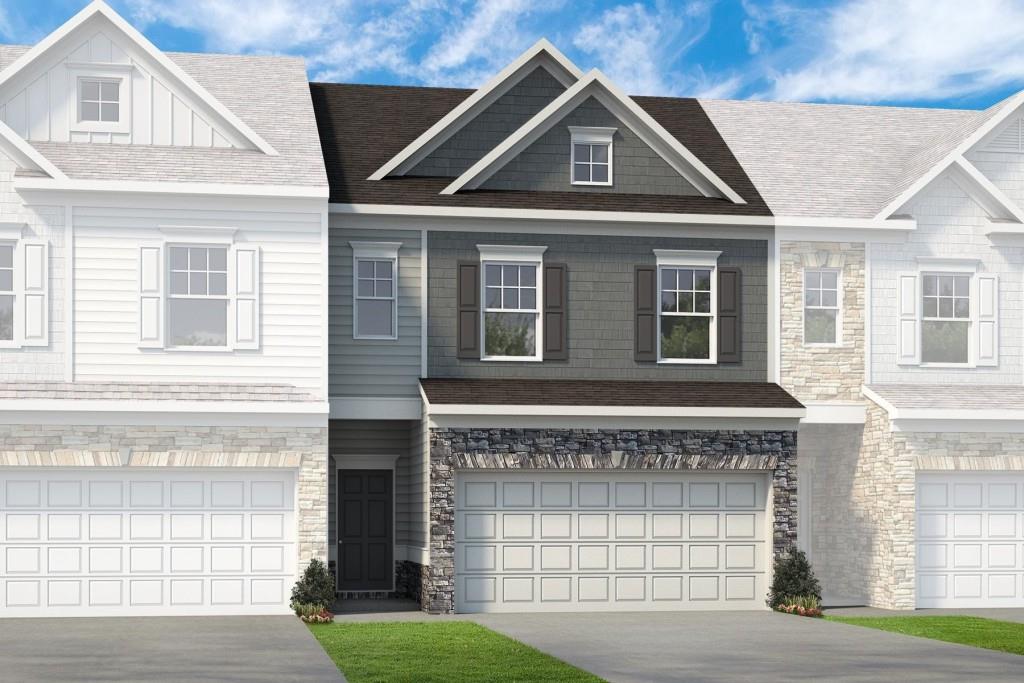 76 Pinnacle Way, Unit 63 Jasper, GA 30143 - Photo 1 of 1 a front view of a house with a yard