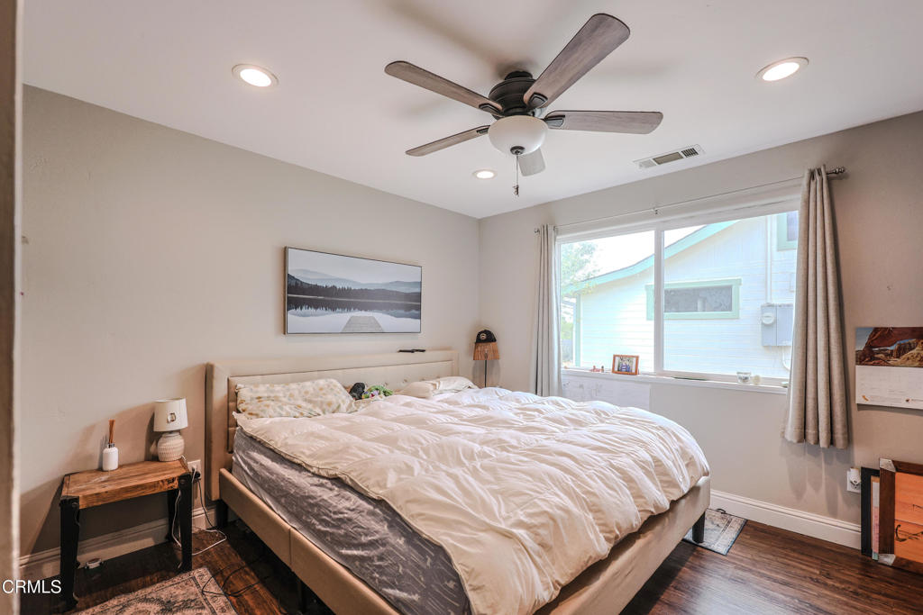 17621 Highway 1 Fort Bragg, CA 95437 - Photo 12 of 23 a bedroom with a bed and a large mirror