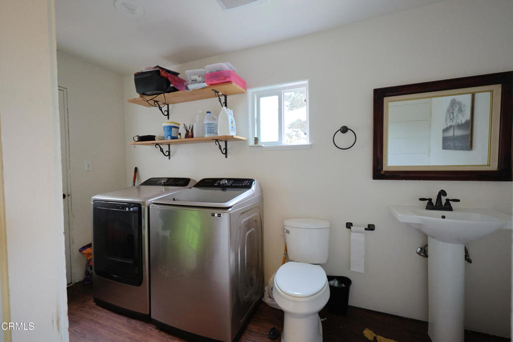 17621 Highway 1 Fort Bragg, CA 95437 - Photo 17 of 23 a bathroom with a sink and mirror with toilet