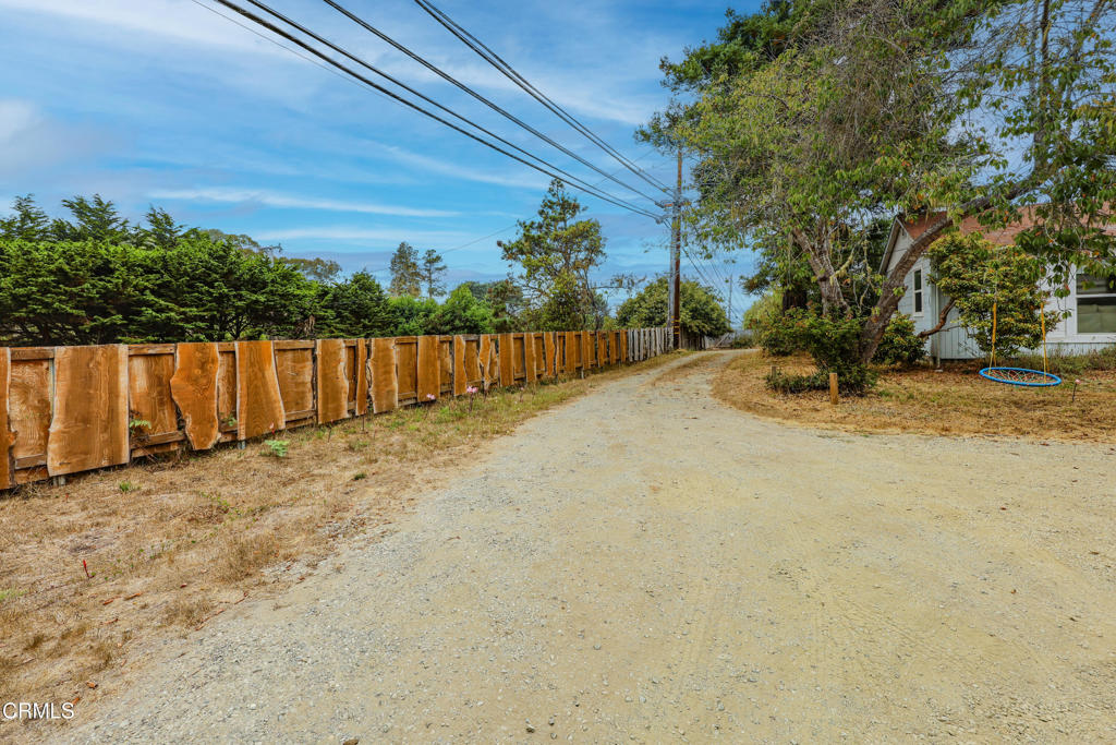17621 Highway 1 Fort Bragg, CA 95437 - Photo 20 of 23 a view of backyard with wooden fence and plants