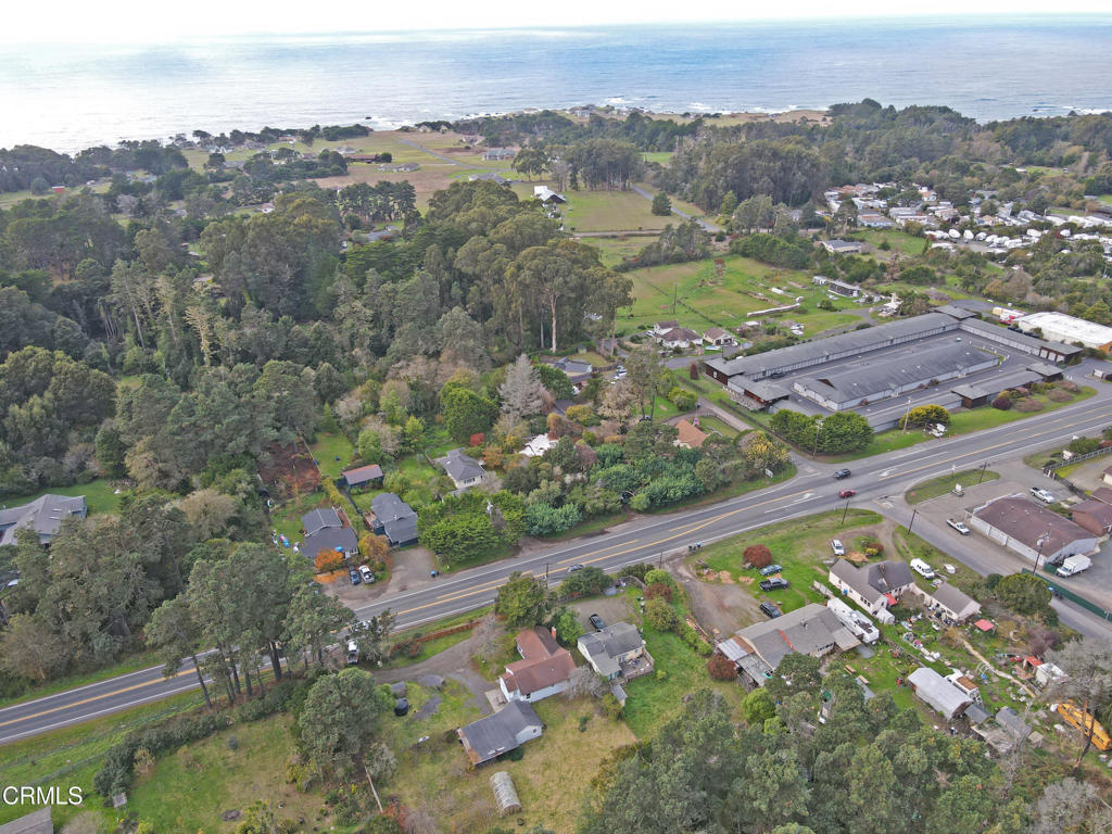 17621 Highway 1 Fort Bragg, CA 95437 - Photo 23 of 23 an aerial view of residential houses with outdoor space and trees