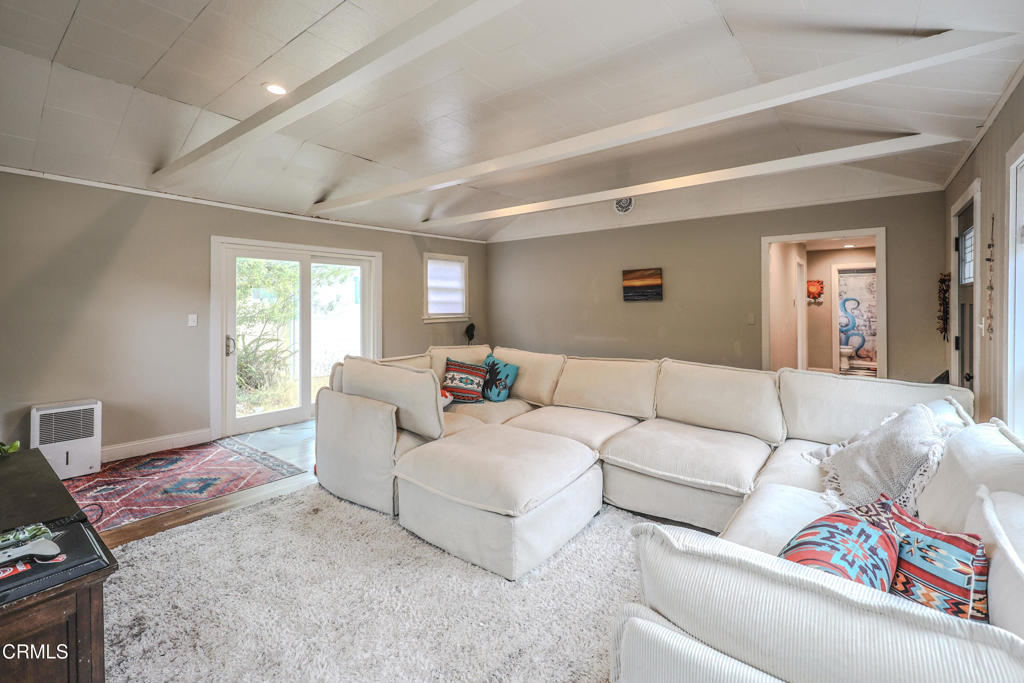 17621 Highway 1 Fort Bragg, CA 95437 - Photo 5 of 23 a living room with furniture and a large window