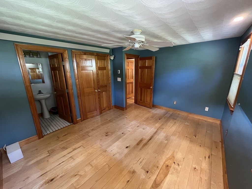 9 Clarissa Road Chelmsford, MA 01824 - Photo 3 of 19 a view of a hallway with wooden floor