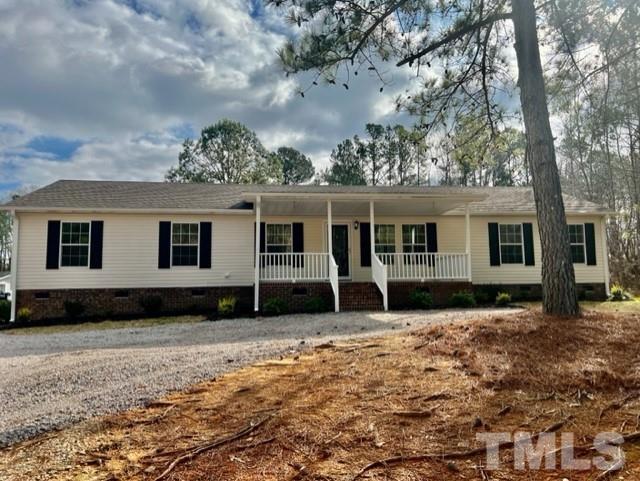 4656 Belltown Road Oxford, NC 27565 - Photo 1 of 24 a front view of a house with a yard