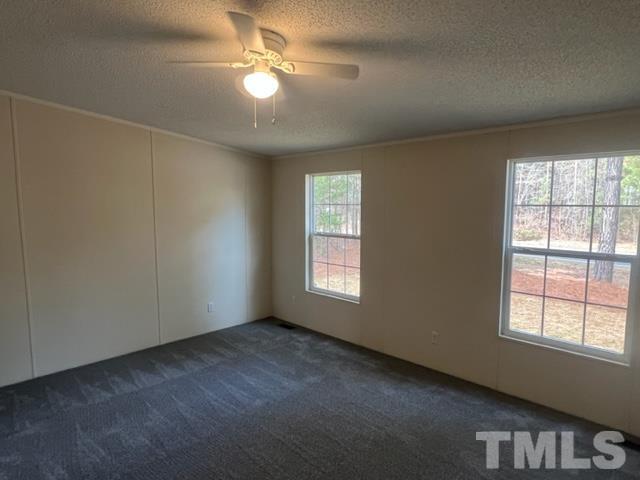 4656 Belltown Road Oxford, NC 27565 - Photo 17 of 24 a view of an empty room with a window