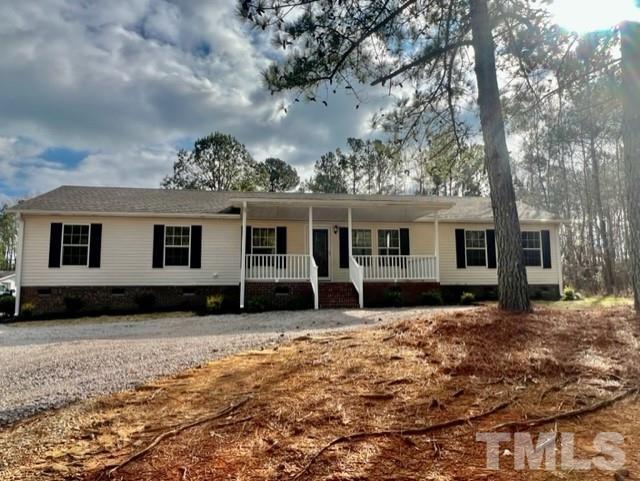 4656 Belltown Road Oxford, NC 27565 - Photo 2 of 24 a view of a house with a yard