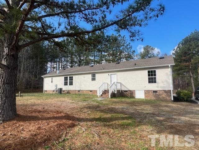 4656 Belltown Road Oxford, NC 27565 - Photo 9 of 24 a view of a house with a yard