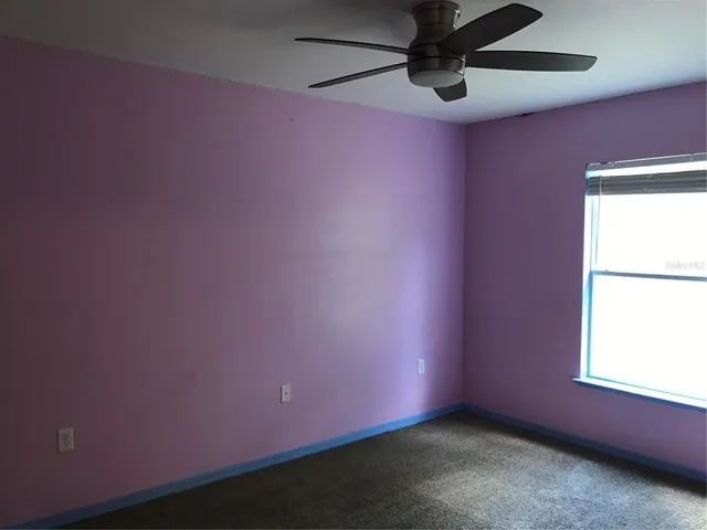 a view of a window in an empty room