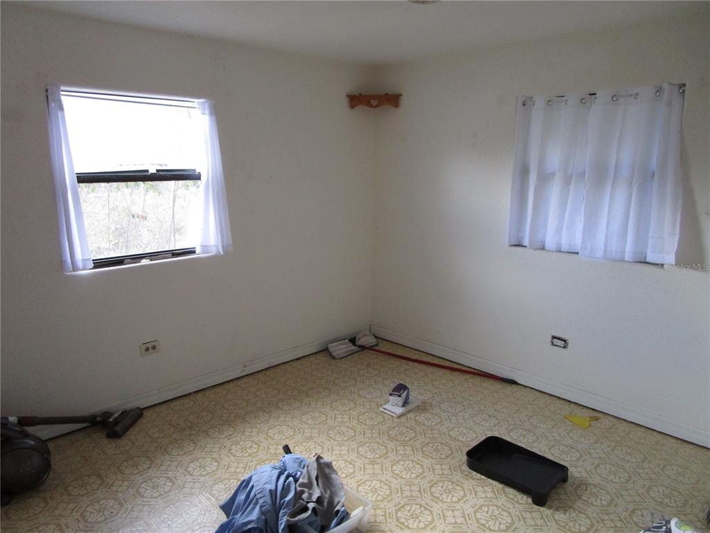 17609 Bathurst Avenue Spring Hill, FL 34610 - Photo 33 of 60 an empty room with a window