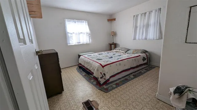 a bathroom with a sink vanity and a mirror