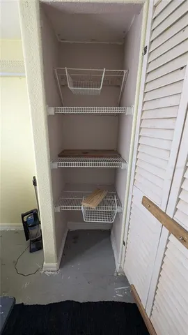 a view of backyard with sitting area