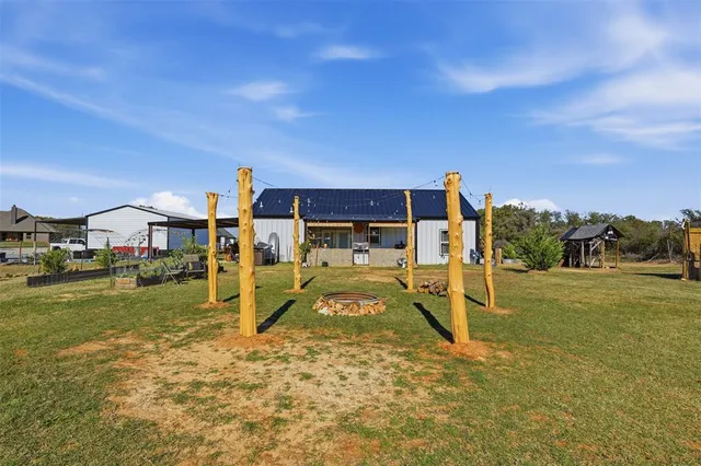 a bedroom with a bed and a chair