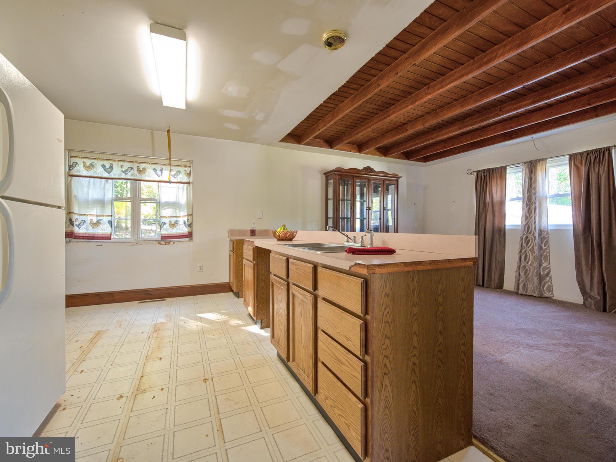 7128 Linganore Road Frederick, MD 21701 - Photo 7 of 30 Large Kitchen area needs finishing work completed.