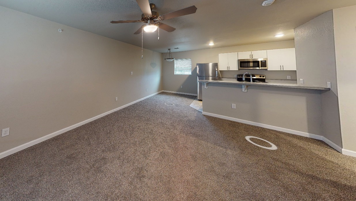 274 Plez Morgan, Unit F Montgomery, TX 77356 - Photo 11 of 13 a view of a kitchen with a sink and cabinets