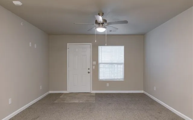 a kitchen with stainless steel appliances granite countertop a refrigerator sink a microwave and cabinets