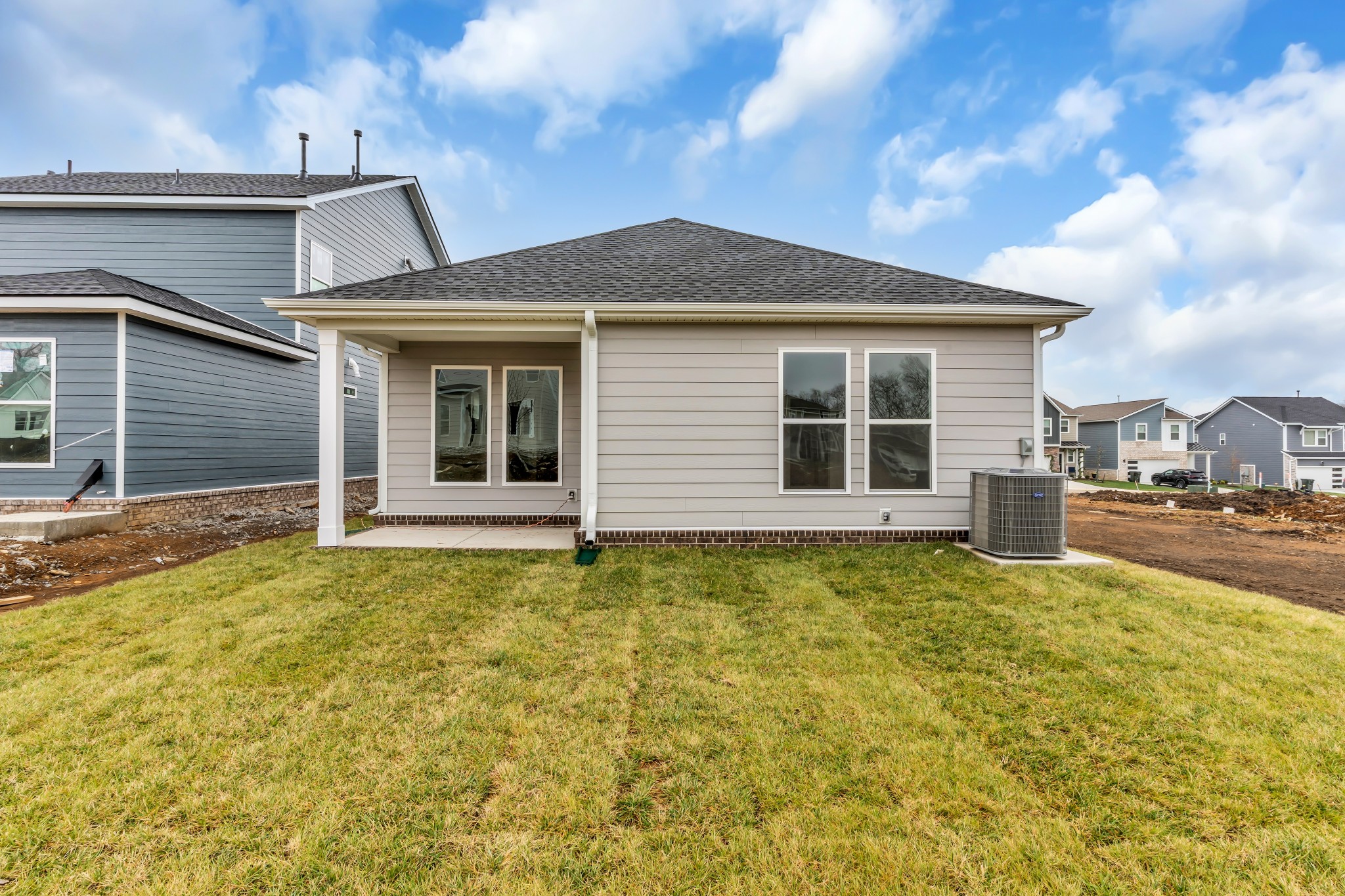 945 Brooklyn Xing Road Gallatin, TN 37066 - Photo 2 of 15 a house with trees in front of it