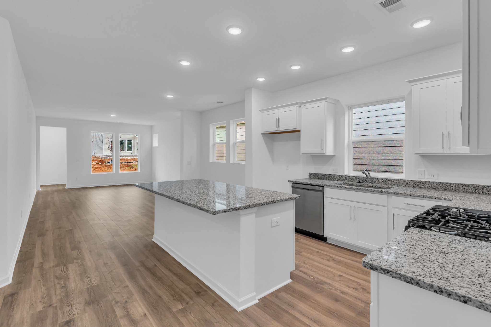 945 Brooklyn Xing Road Gallatin, TN 37066 - Photo 6 of 15 a kitchen with stainless steel appliances granite countertop a stove a sink and a refrigerator