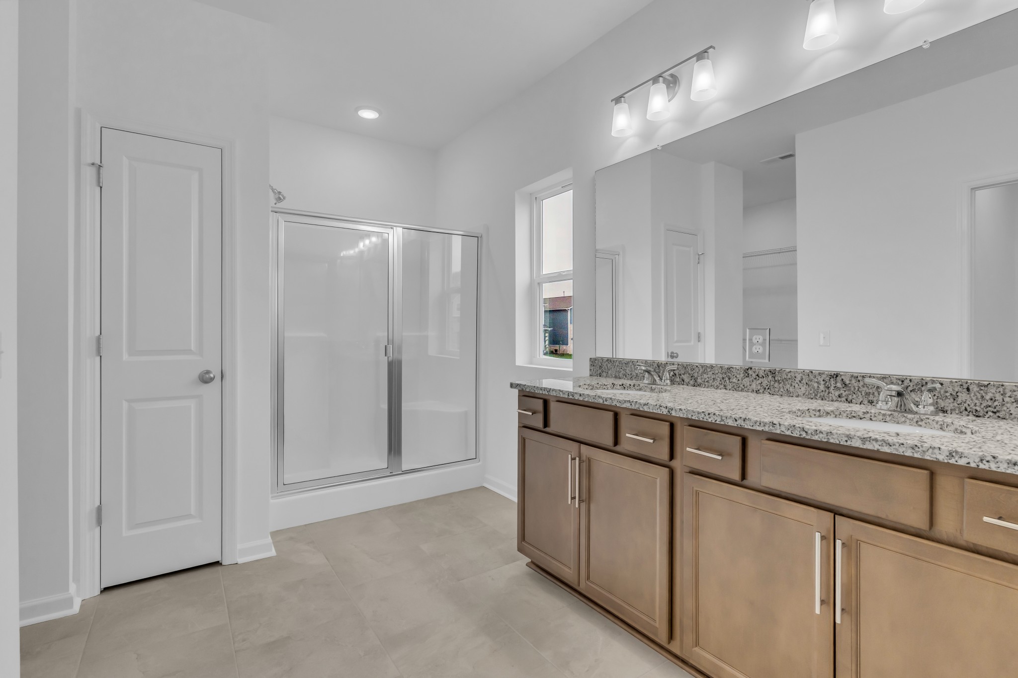 945 Brooklyn Xing Road Gallatin, TN 37066 - Photo 10 of 15 a bathroom with a granite countertop sink and a mirror