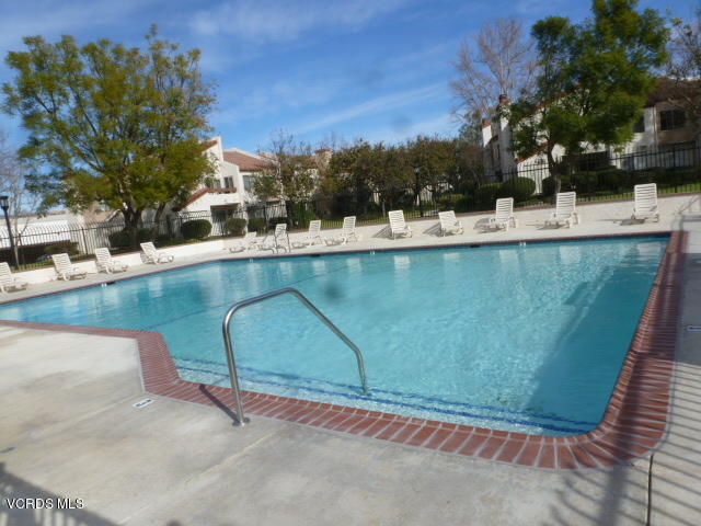 1736 Sinaloa Road, Unit 321 Simi Valley, CA 93065 - Photo 2 of 26 a view of swimming pool with a yard and sitting area