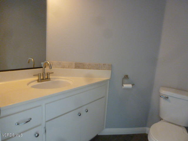 1736 Sinaloa Road, Unit 321 Simi Valley, CA 93065 - Photo 14 of 26 a bathroom with a sink and a toilet