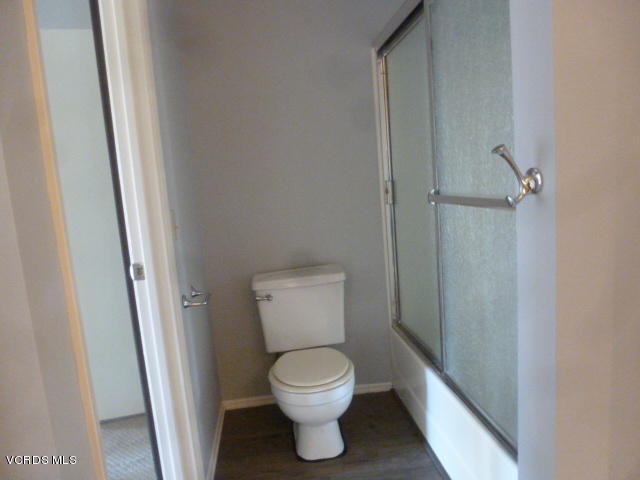1736 Sinaloa Road, Unit 321 Simi Valley, CA 93065 - Photo 19 of 26 a bathroom with a toilet and a shower