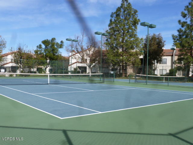 1736 Sinaloa Road, Unit 321 Simi Valley, CA 93065 - Photo 3 of 26 a view of a tennis court
