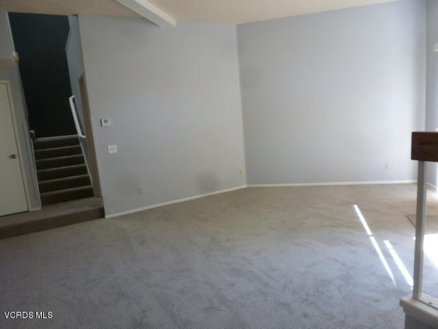 1736 Sinaloa Road, Unit 321 Simi Valley, CA 93065 - Photo 21 of 26 a view of an empty room with stairs