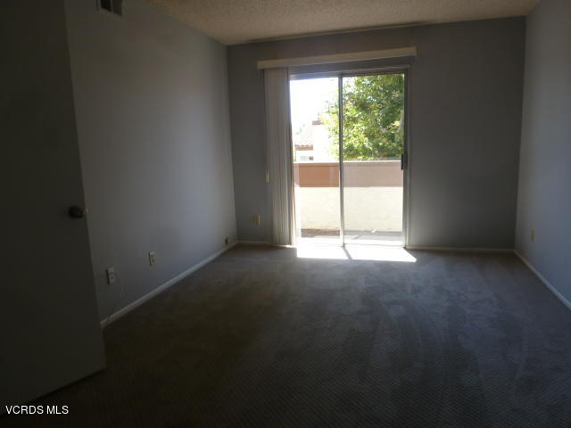 1736 Sinaloa Road, Unit 321 Simi Valley, CA 93065 - Photo 22 of 26 a view of empty room with floor to ceiling fan