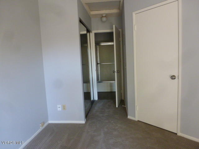 1736 Sinaloa Road, Unit 321 Simi Valley, CA 93065 - Photo 23 of 26 a view of an empty room with closet and a window