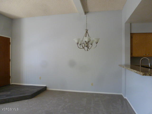 1736 Sinaloa Road, Unit 321 Simi Valley, CA 93065 - Photo 7 of 26 a view of a room with a sink and cabinets