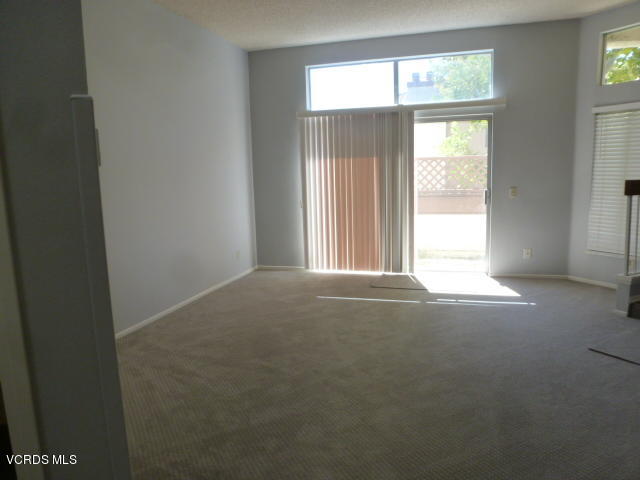 1736 Sinaloa Road, Unit 321 Simi Valley, CA 93065 - Photo 8 of 26 an empty room that has a window