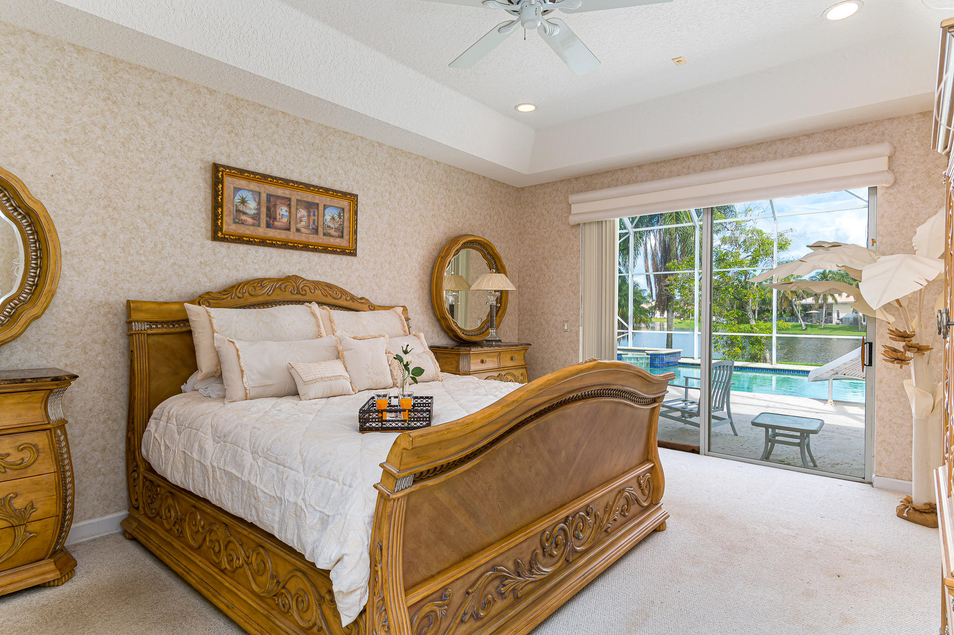 21605 Halstead Drive Boca Raton, FL 33428 - Photo 16 of 43 a bed sitting in a spacious bedroom next to a window