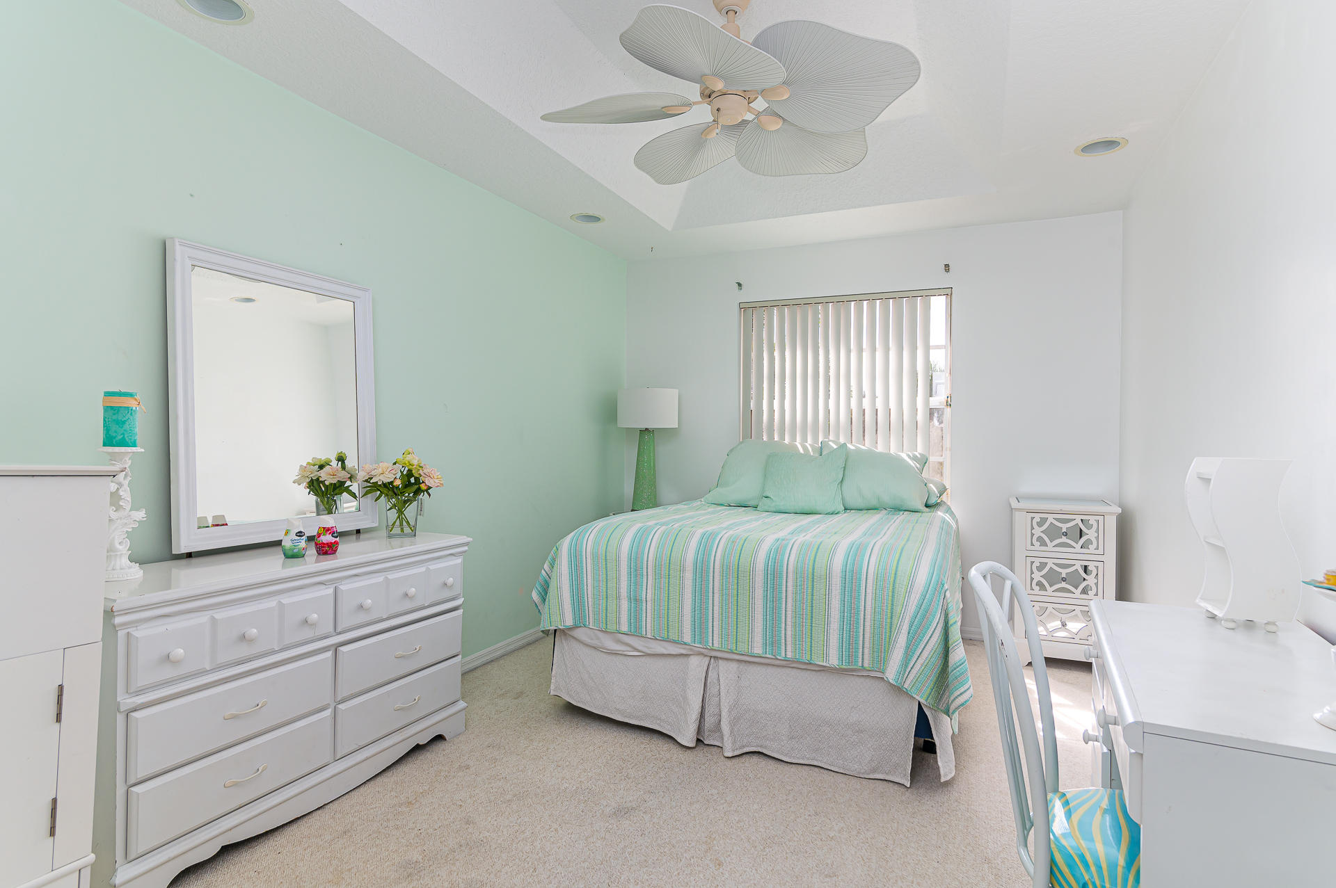 21605 Halstead Drive Boca Raton, FL 33428 - Photo 17 of 43 a bedroom with a bed and a dresser