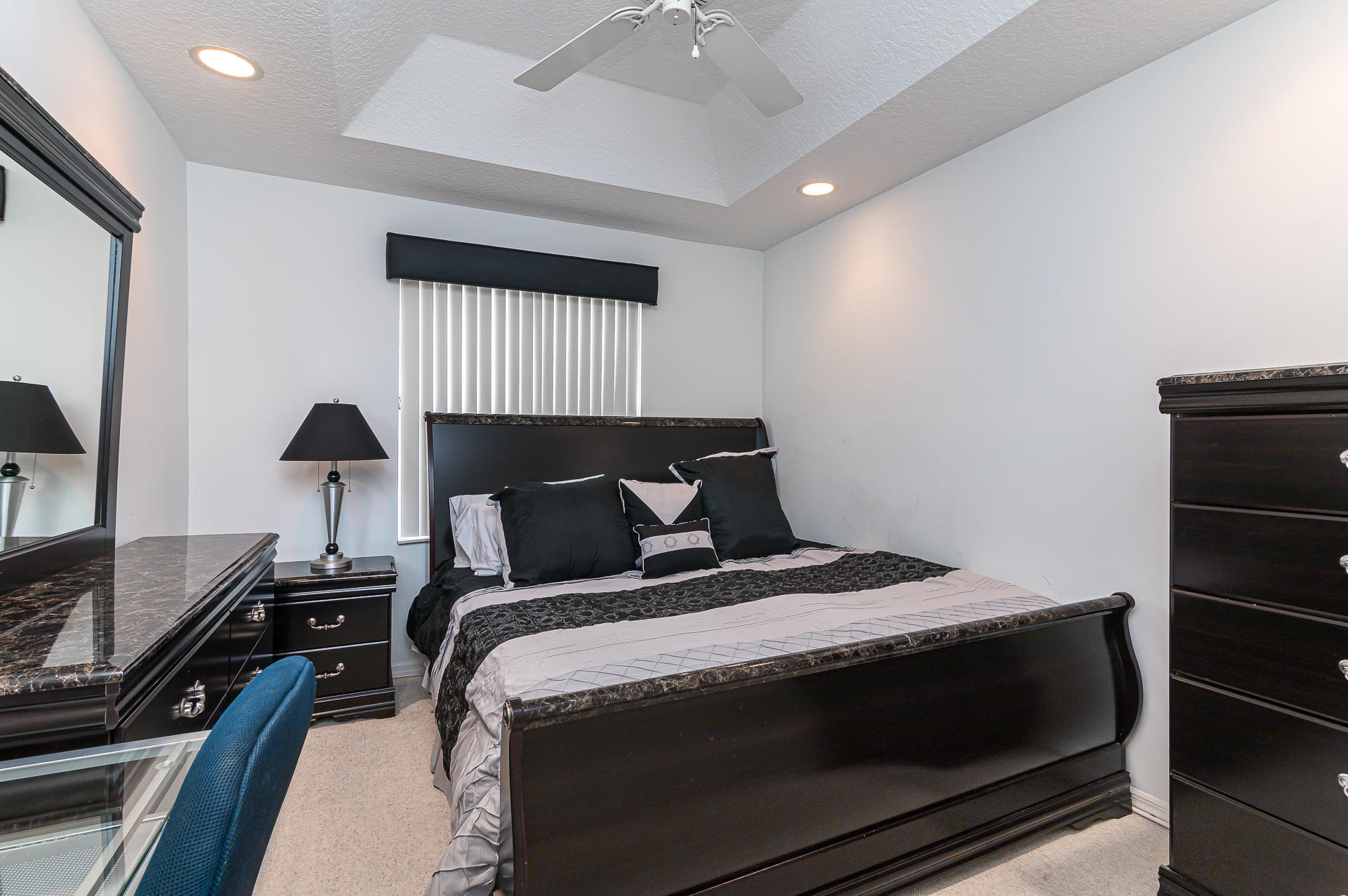 21605 Halstead Drive Boca Raton, FL 33428 - Photo 19 of 43 a bedroom with a bed and a lamp