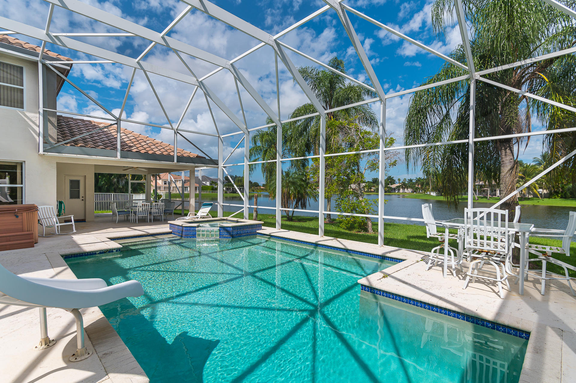 21605 Halstead Drive Boca Raton, FL 33428 - Photo 24 of 43 a view of a house with a backyard patio and sitting area
