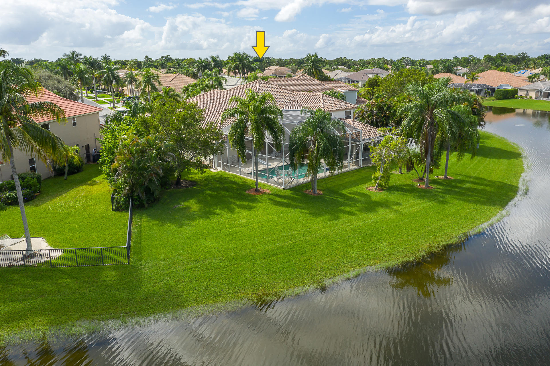 21605 Halstead Drive Boca Raton, FL 33428 - Photo 37 of 43 a view of a lake with a building in front of it