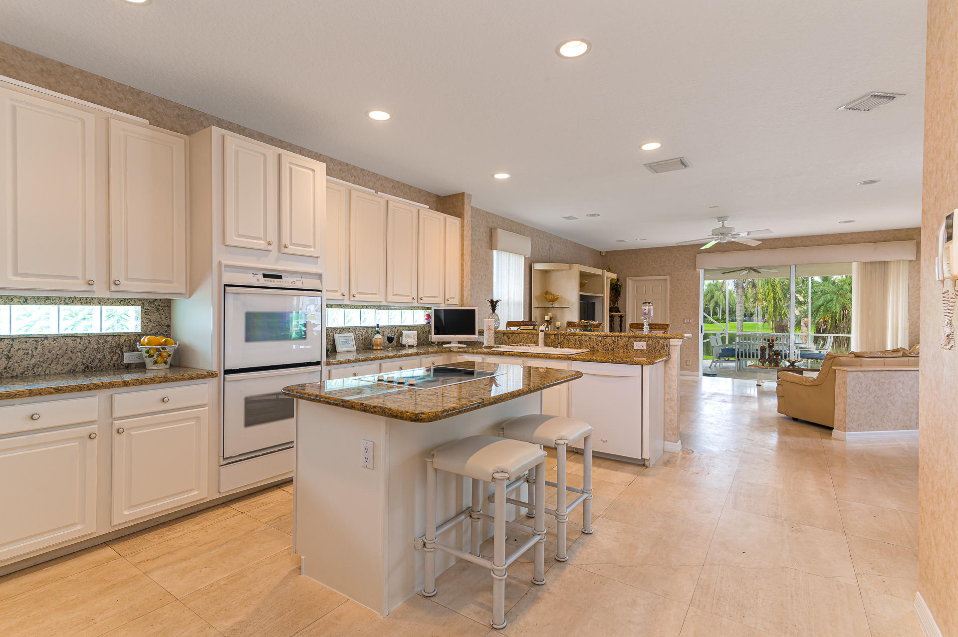 21605 Halstead Drive Boca Raton, FL 33428 - Photo 7 of 43 a kitchen with a sink and cabinets