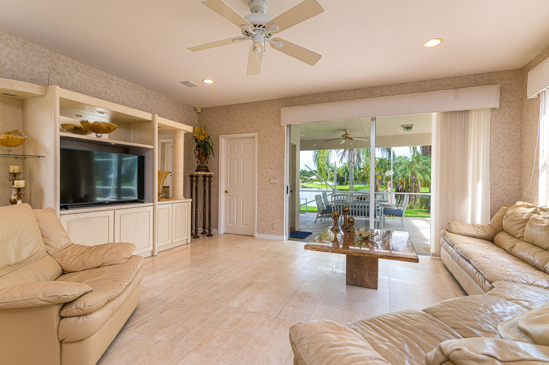 21605 Halstead Drive Boca Raton, FL 33428 - Photo 9 of 43 a living room with furniture and large windows