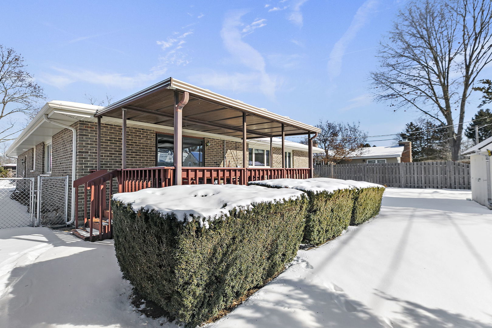 617 Sharon Drive Crystal Lake, IL 60014 - Photo 23 of 26 a front view of a house with a garden
