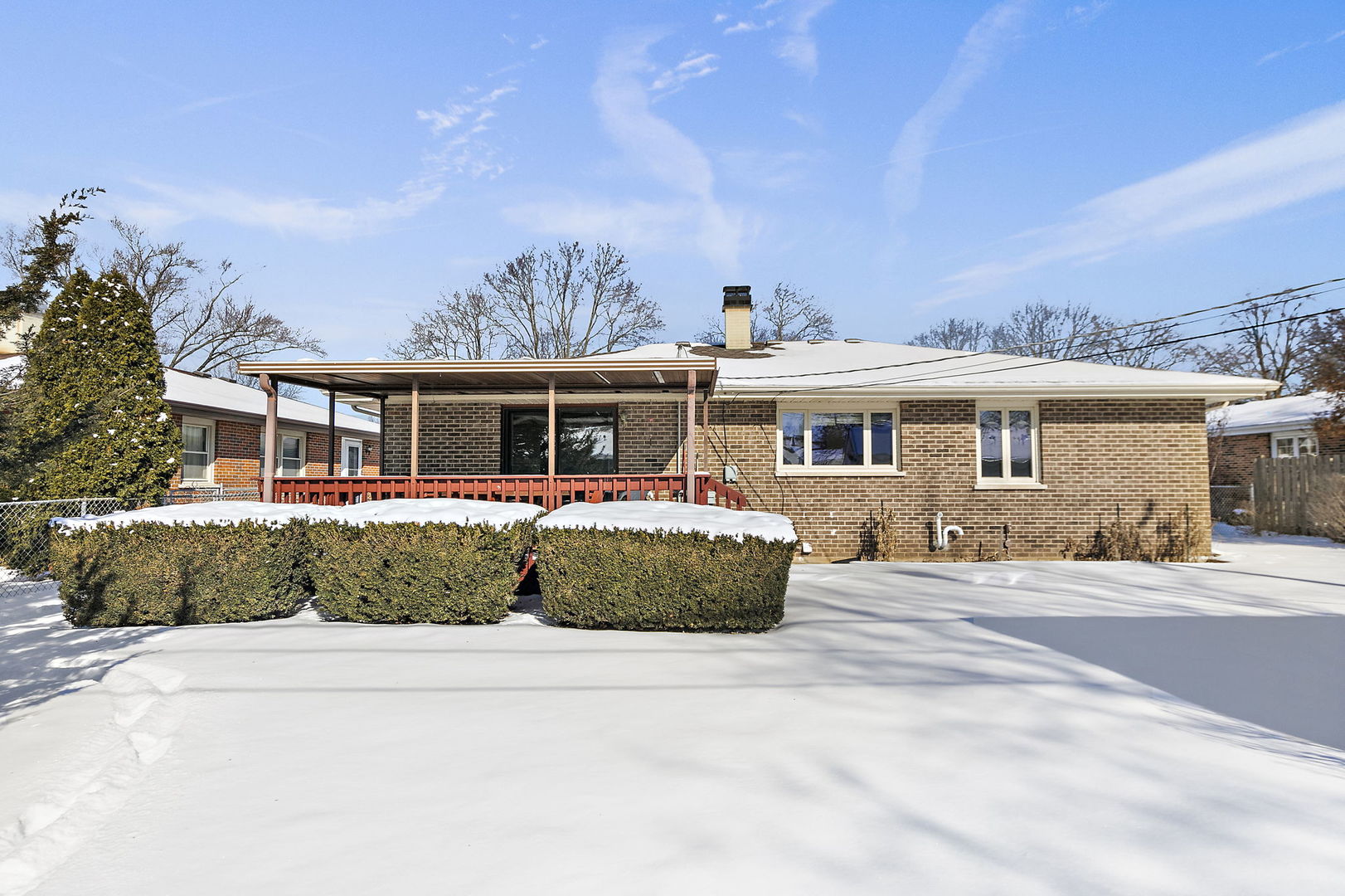 617 Sharon Drive Crystal Lake, IL 60014 - Photo 24 of 26 a front view of a house with a garden