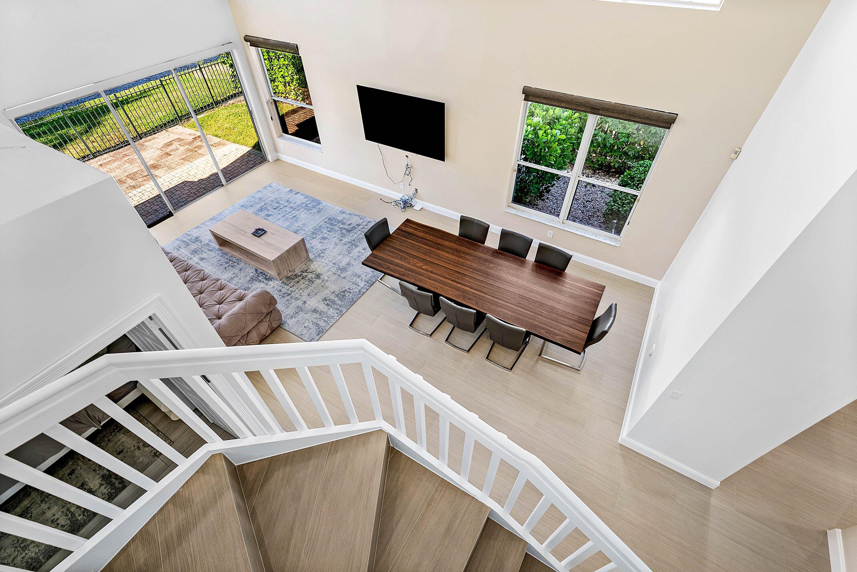 5855 Northwest 42nd Way Boca Raton, FL 33496 - Photo 24 of 77 a living room with furniture and a flat screen tv