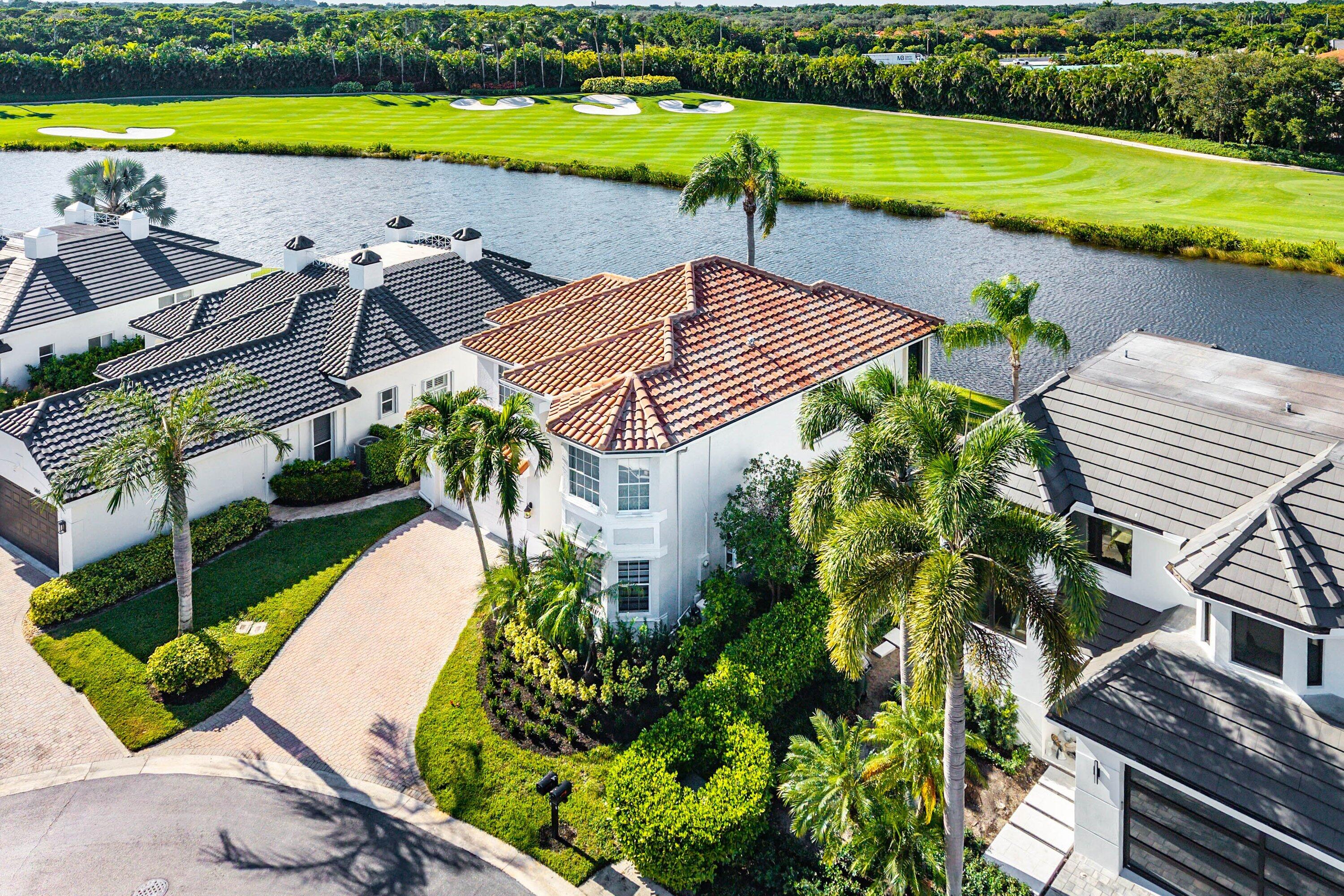 5855 Northwest 42nd Way Boca Raton, FL 33496 - Photo 49 of 77 an aerial view of a house with a swimming pool patio and outdoor seating