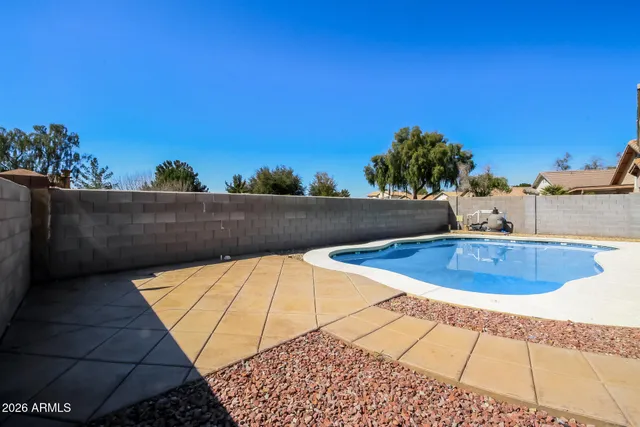a view of outdoor space and swimming pool